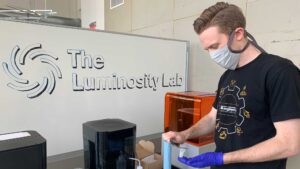 Graduate research assistant Clinton Ewell works in Luminosity’s facilities at the Polytechnic campus