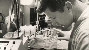 black and white photo of The late ASU Professor William Dorson working in a lab at St. Joseph's Hospital