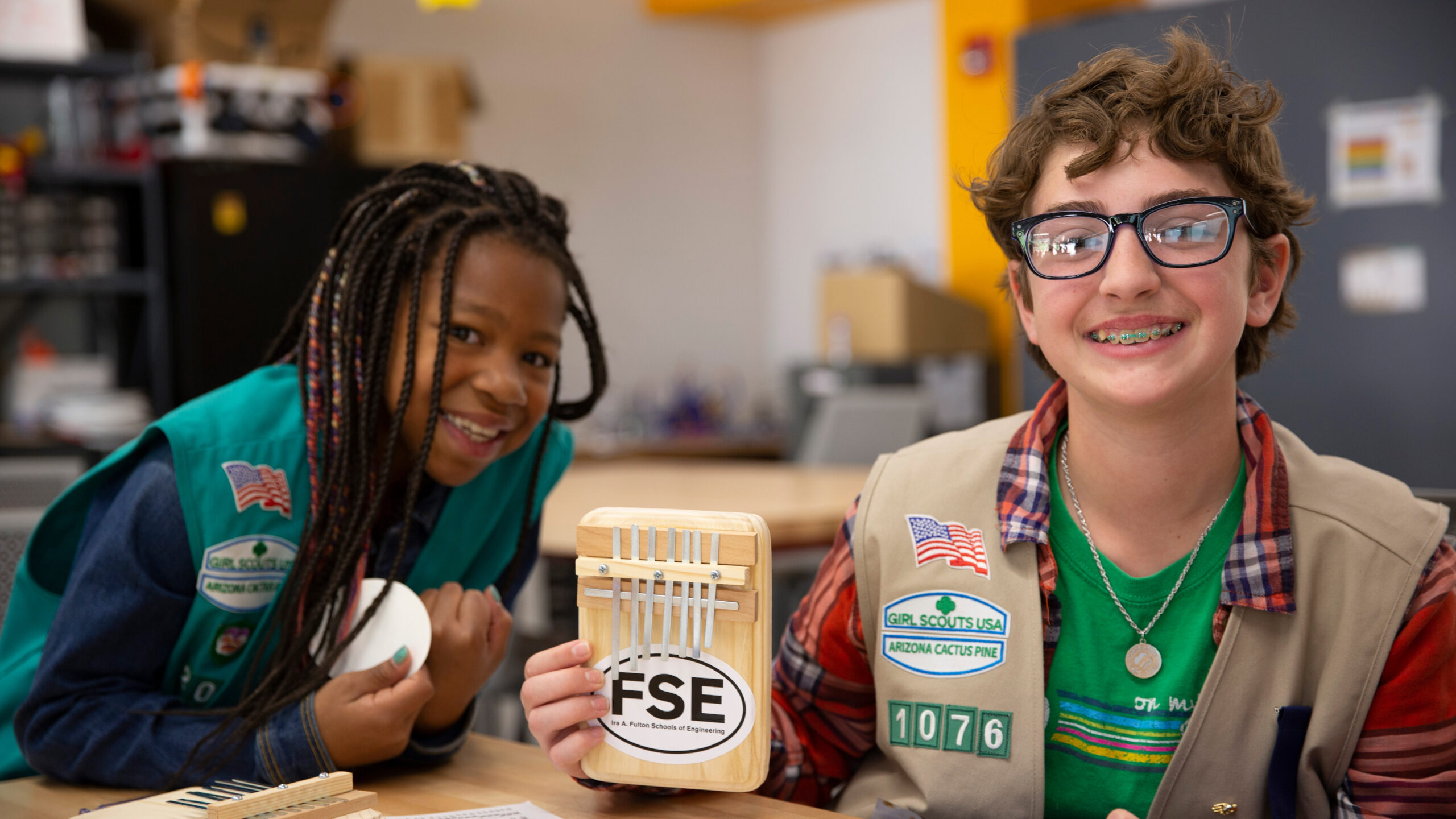 Two Girl Scouts work on a project at a Fulton Schools experience