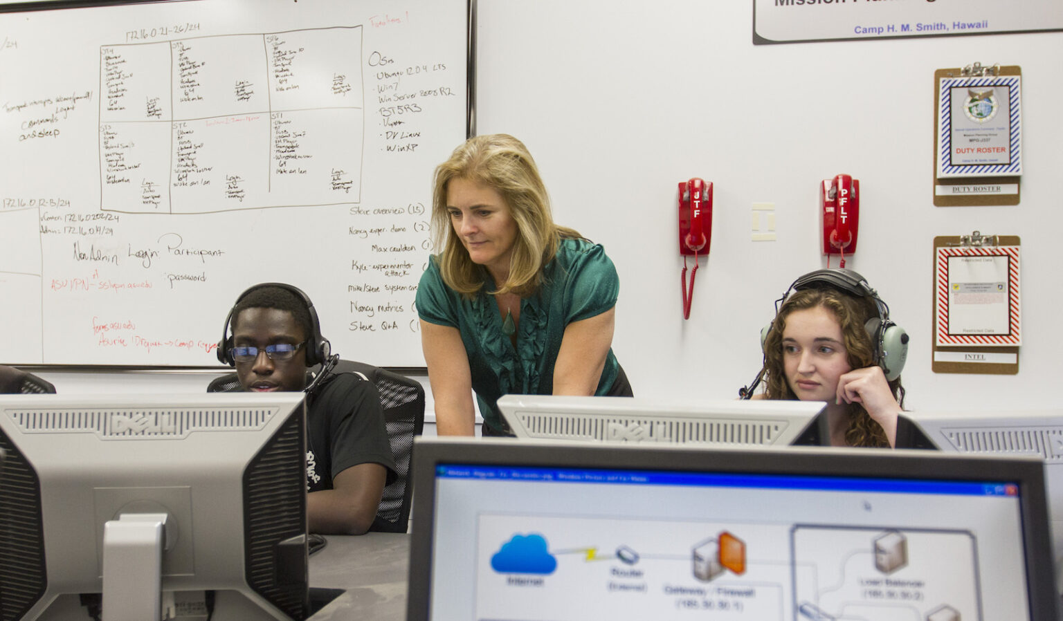 Nancy Cooke guides students in a human systems engineering lab