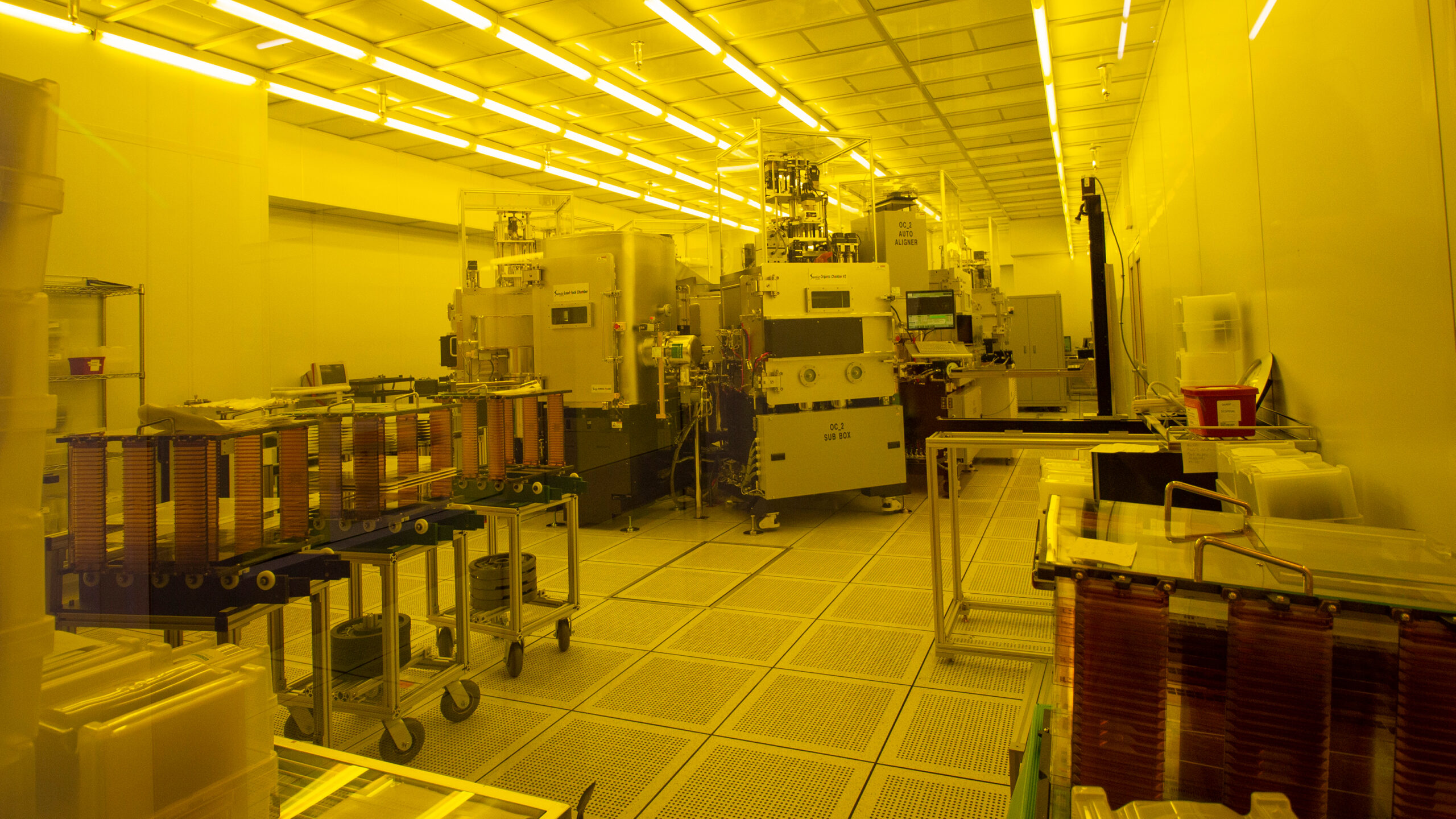 Interior view of ASU's MacroTechnology Works lab under golden yellow light