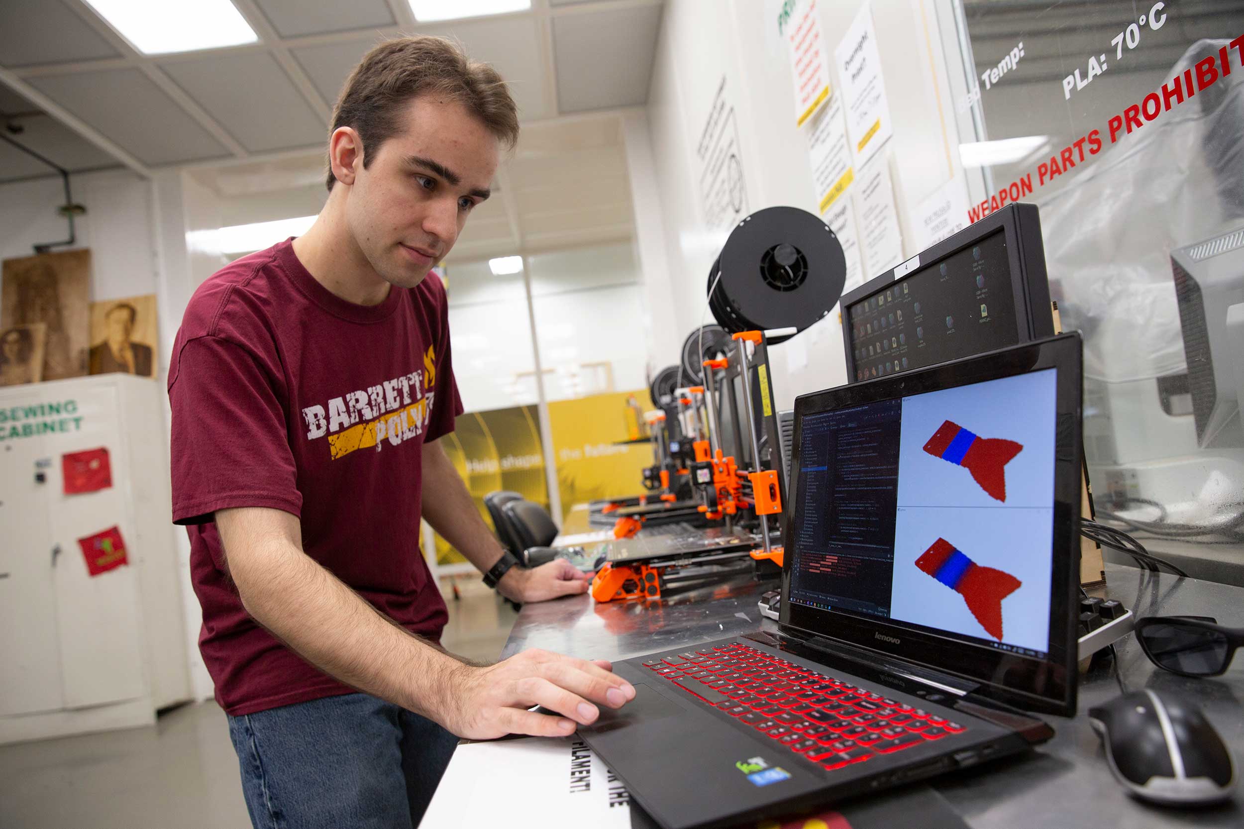 An ASU Engineering student works on a project a lab