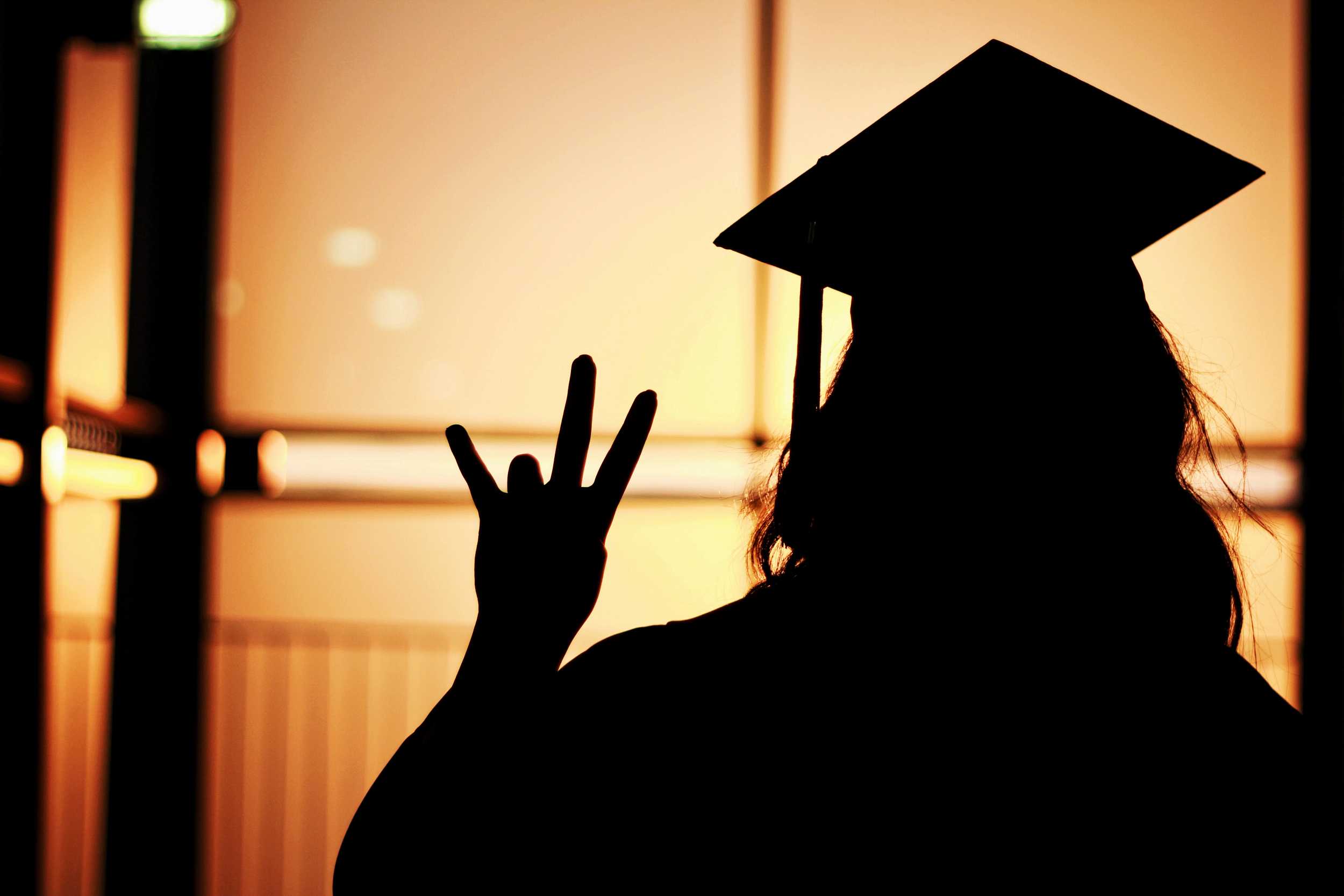 silhouette of a female graduate