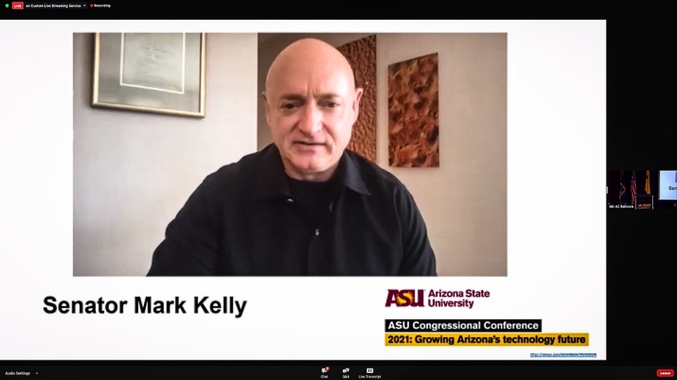 Screenshot of Mark Kelly speaking at the conference