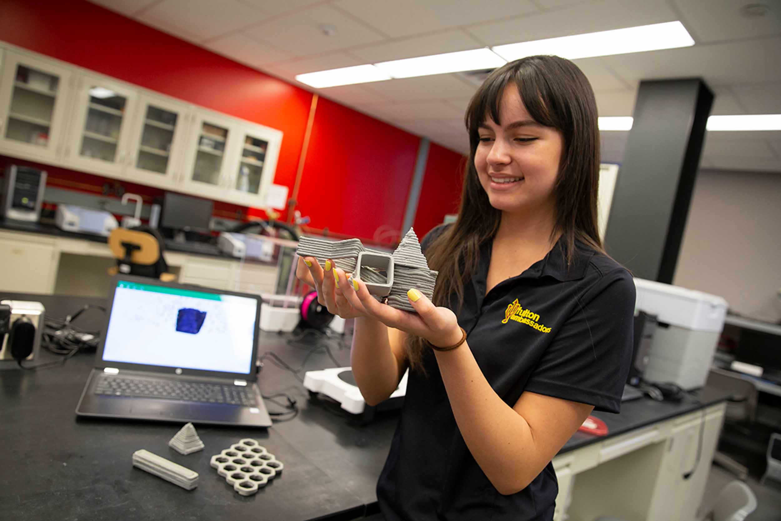 Civil engineering student Emily Alcazar worked to advance the current state of 3D-printed concrete in Professor Narayanan Neithalath’s lab for a future of faster, cheaper and cleaner construction. Photographer: Jessica Hochreiter/ASU