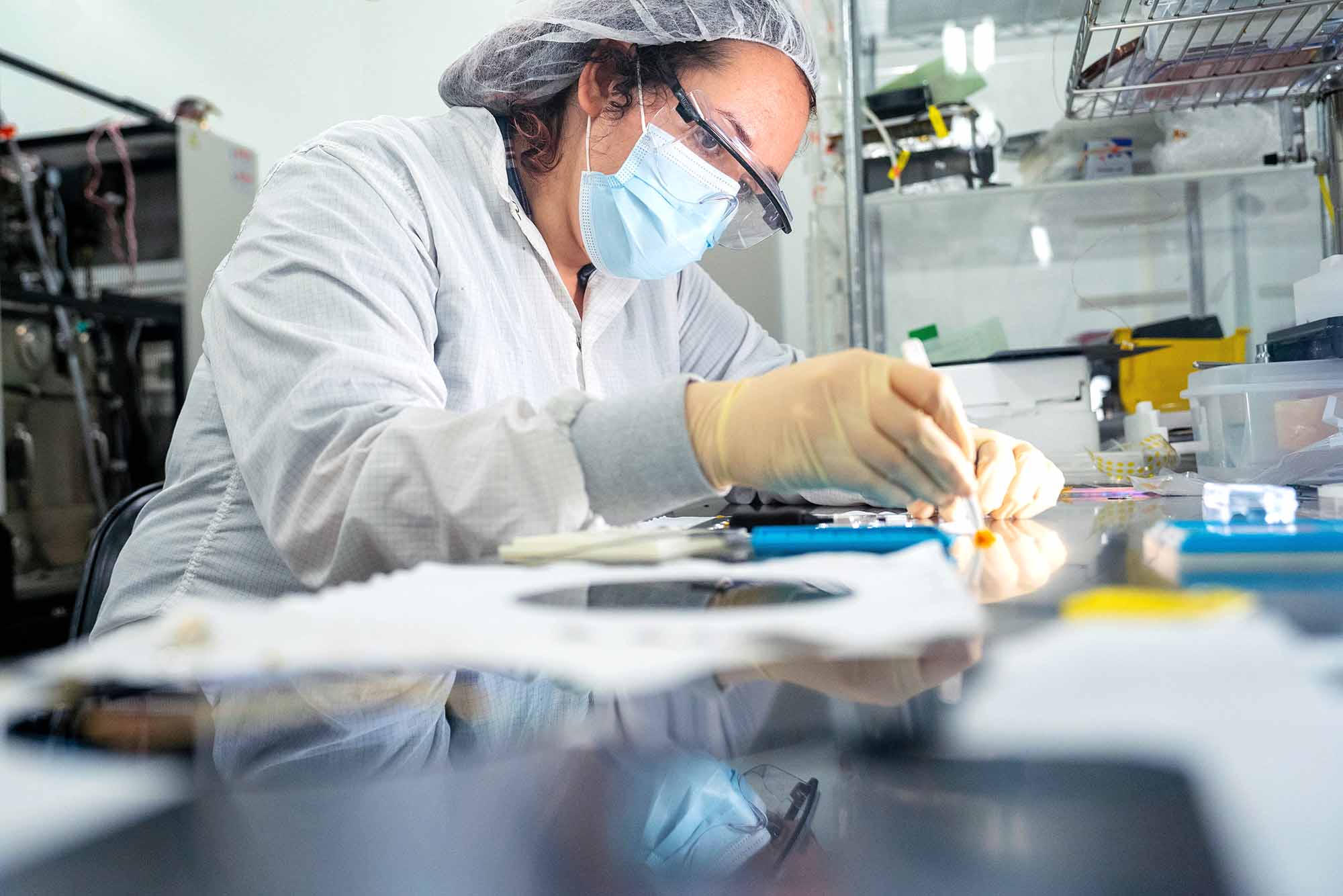 A researcher works with semiconductor materials at Arizona State University’s MacroTechnology Works in Tempe, Arizona.
