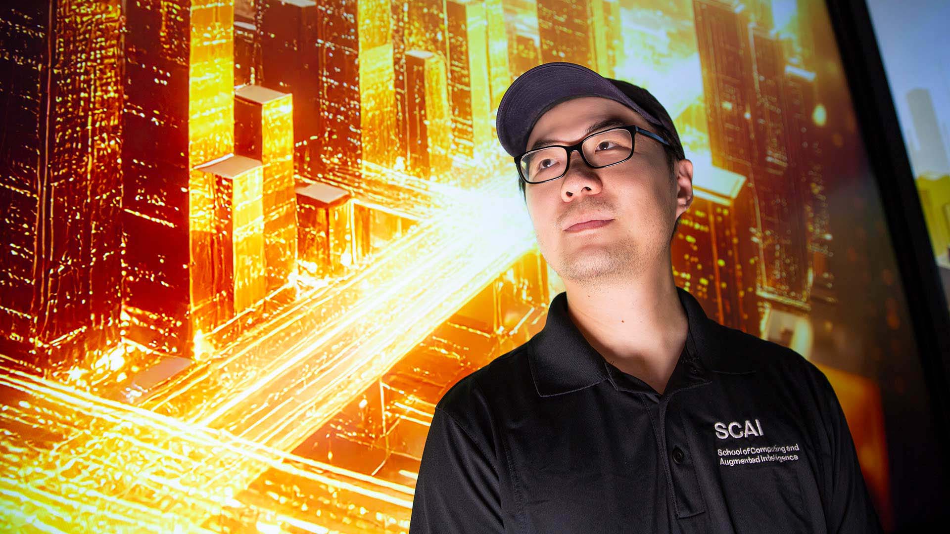 A person wearing glasses and a cap stands in front of a brightly illuminated digital background showing glowing city buildings.